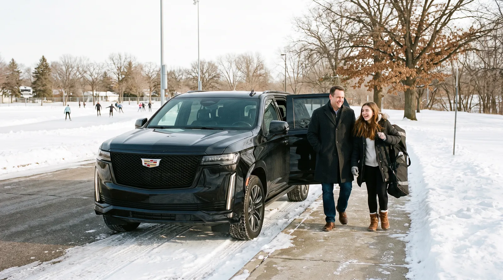 Black Cadillac Escalade parked at the curb outside a hotel entrance near Rosedale Center in Roseville, Minnesota, in winter